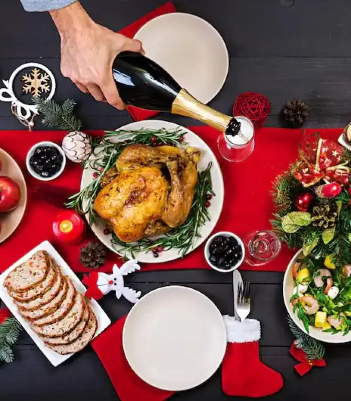 baked-turkey-christmas-dinner-christmas-table-is-served-with-turkey-decorated-with-bright-tinsel-candles-fried-chicken-table-family-dinner-top-view_2829-6078 (1)
